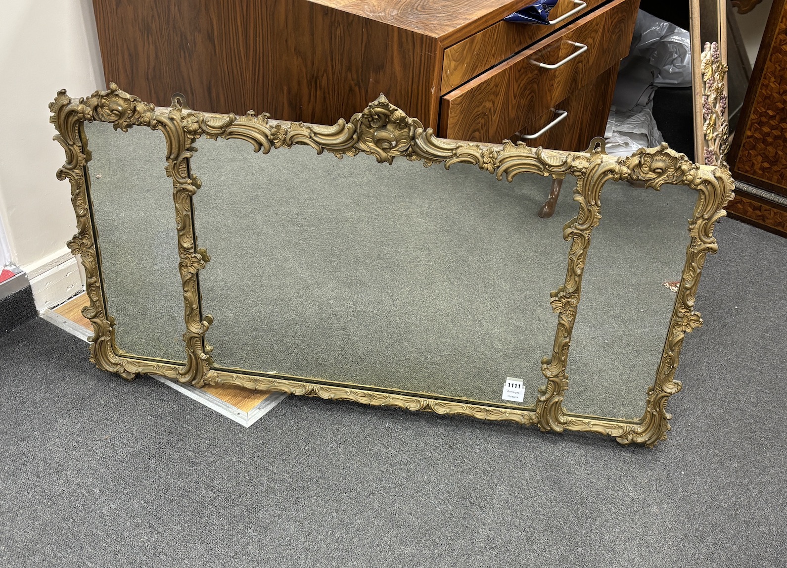 A giltwood and composition triple plate overmantel mirror, width 115cm, height 66cm